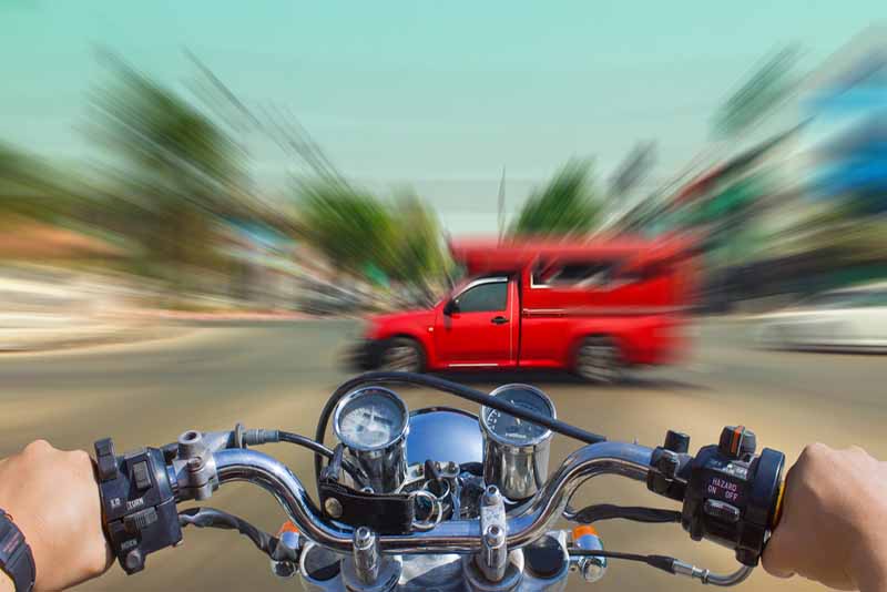 man on a motorcycle speeding