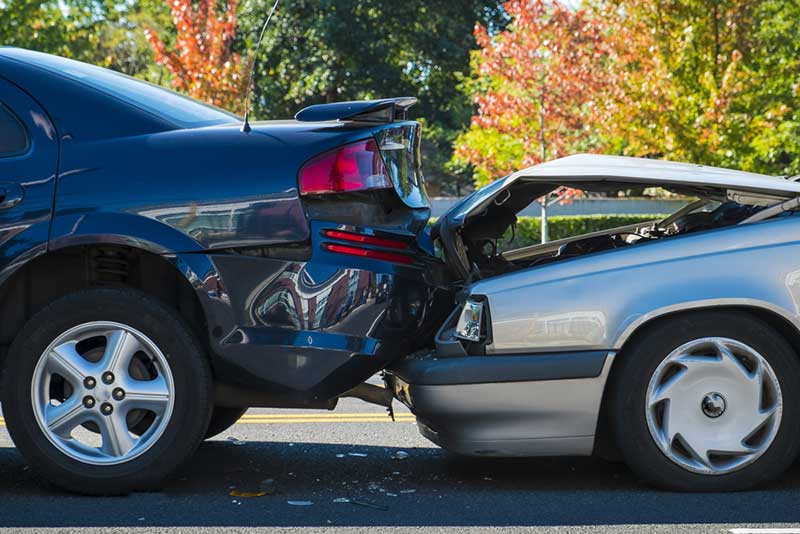 gray car rear ended blue car